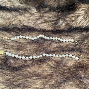 Elegant Gold and Cream Pearl Bracelet